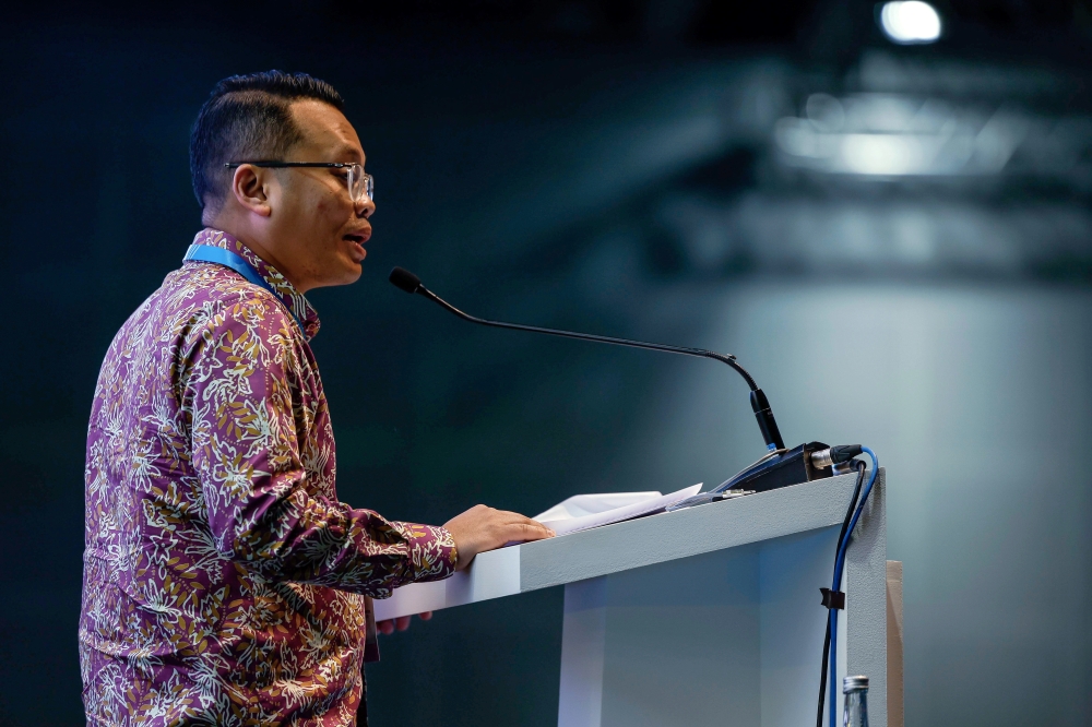 Minister of National Resources, Environment and Climate Change Nik Nazmi Nik Ahmad delivers a speech at the Energy Transition Conference launching ceremony in Kuala Lumpur August 28, 2023. — Bernama pic