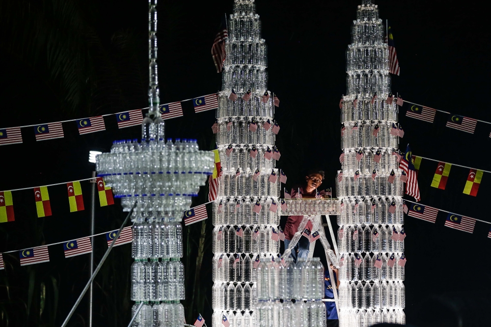 The brothers started collecting the bottles from July 27 and to ensure the bottles are of the correct size, only Spritzer, Cactus or Seamaster brands are used. — Picture by Sayuti Zainudin