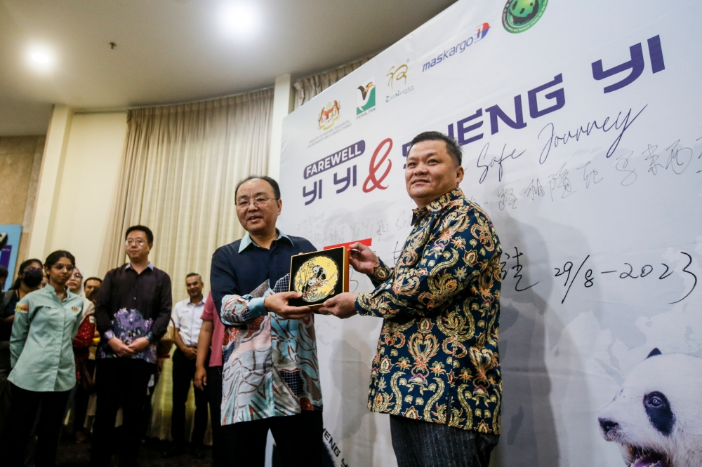 Deputy Natural Resources, Environment, and Climate Change Minister Datuk Seri Huang Tiong Sii (right) and RRC Ambassador to Malaysia Ouyang Yujing (left) at the Giant Panda Convention Centre (GPCC) in Zoo Negara, Kuala Lumpur August 29, 2023. — Picture by Hari Anggara