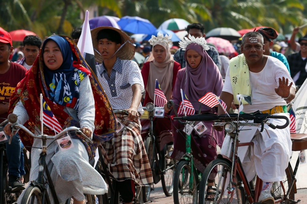 Owners of classic bicycles participate in the parade during the state-level 2023 National Day celebration in Pahang, held at the grounds of Padang Majlis Bandaraya Kuantan (MBK), August 31, 2023. — Bernama pic 