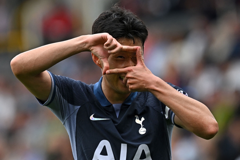 Tottenham Hotspur's South Korean striker #07 Son Heung-Min celebrates after scoring their fifth goal during the English Premier League football match between Burnley and Tottenham Hotspur at Turf Moor in Burnley September 2, 2023. — AFP pic