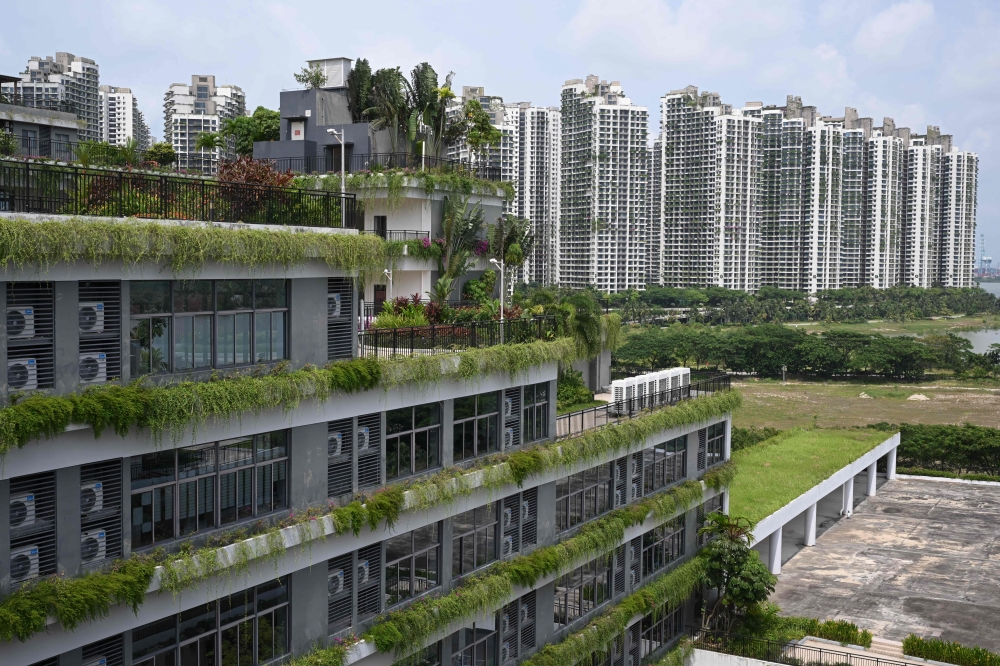 A general view of condominiums (back) at Forest City. — AFP pic