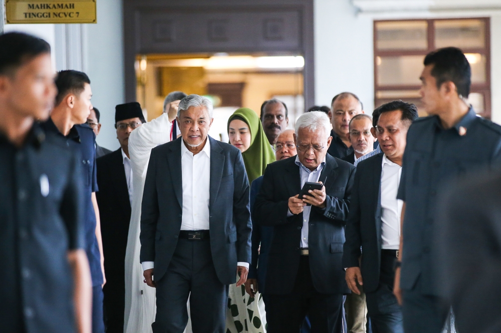 Yesterday, the High Court dismissed but declined to grant a full acquittal (DNAA) to Datuk Seri Ahmad Zahid Hamidi from all 47 charges in his Yayasan Akalbudi trial as asked by the defence after the prosecution said it would not continue the trial against the BN chairman. — Picture by Ahmad Zamzahuri