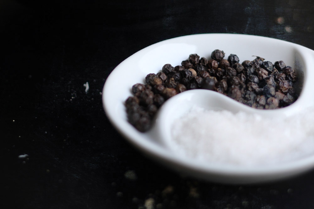 Black peppercorns and sea salt.