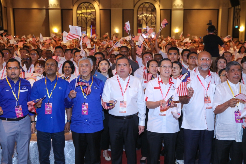 Umno president Datuk Seri Ahmad Zahid Hamidi and DAP secretary-general Anthony Loke (centre) and other party leaders at the DAP national congress at Marriot Hotel in Putrajaya September 10, 2023. — Picture by Yusof Mat Isa