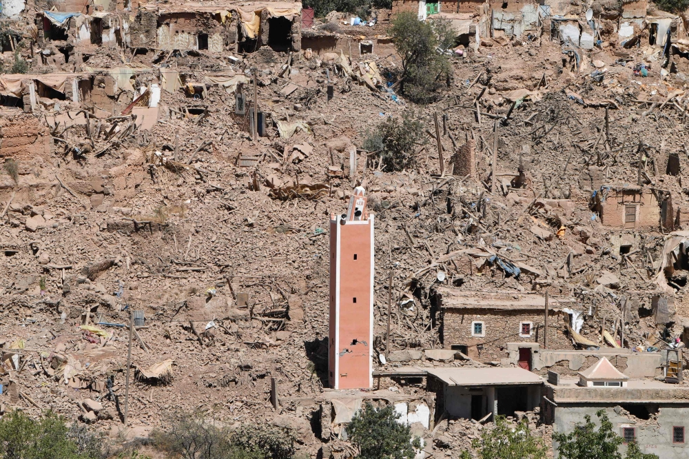 A general view shows the damage and destruction in the village of Tikht, near Adassil. — AFP pic