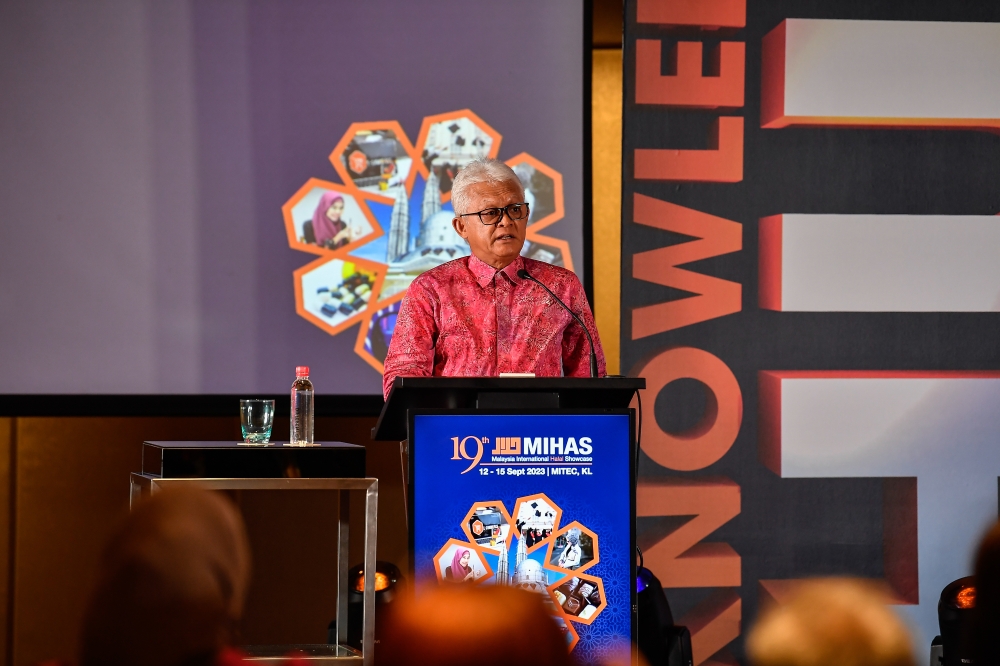 Matrade CEO Datuk Mohd Mustafa Abdul Aziz delivers his welcoming remarks at the 19th Malaysia International Halal Showcase (Mihas) 2023 ‘Knowledge Hub’ sessions in Kuala Lumpur September 13, 2023. — Bernama pic