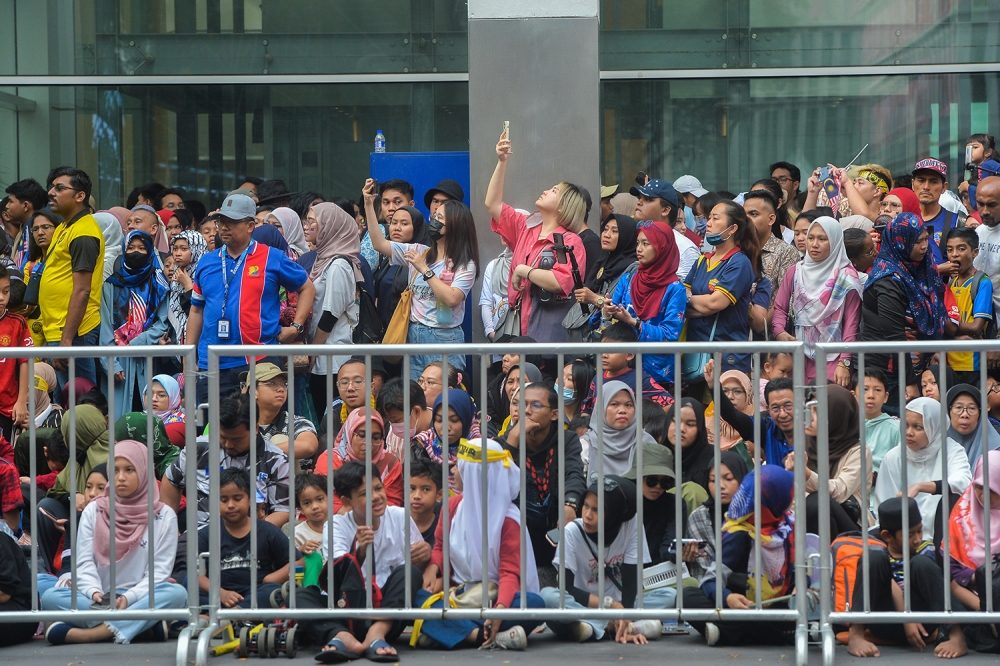 People attend the National Day celebration in Putrajaya August 31, 2023. Dozens of ethnic groups and religions have lived together on our shores for centuries. This should be something we cherish — but we could lose it all very quickly if we don’t nip the growing polarisation in the bud. — Picture by Miera Zulyana