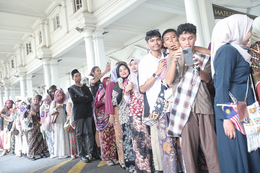 The Keretapi Sarong was first introduced by a non-governmental organisation (NGO), Random Alphabet, in 2012 before being taken over by Locco in 2017, involving thousands of participants travelling on public transport wearing either batik or pelikat sarongs as the main uniform. — Picture by Farhan Najib