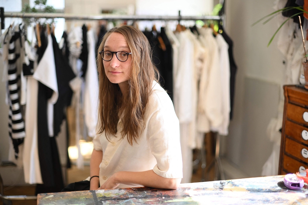 British fashion designer Phoebe English poses in her studio in Deptford, south of London, on September 1, 2023. — AFP pic