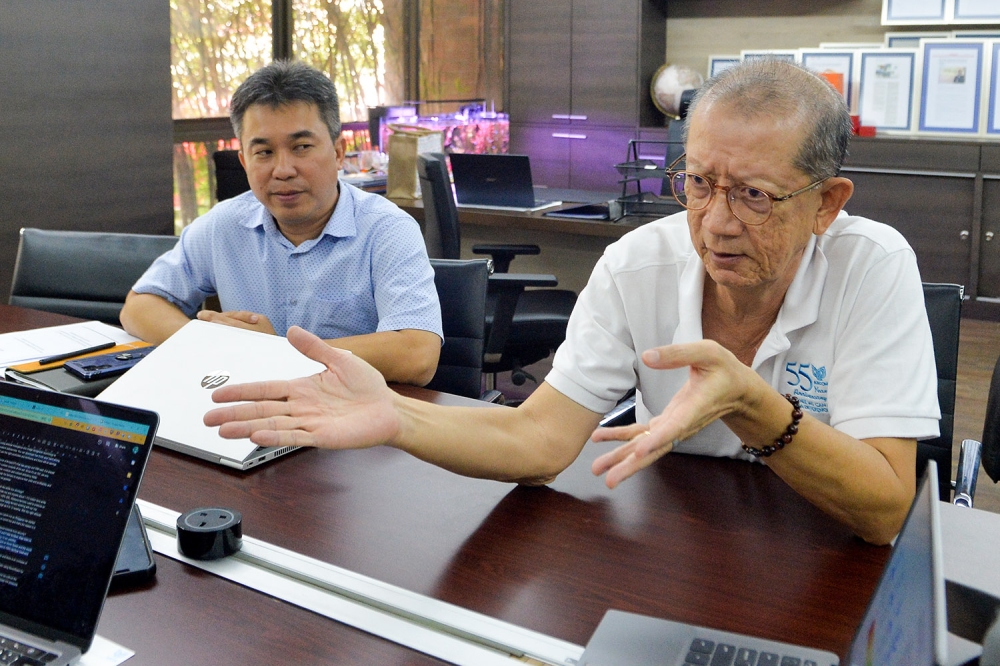 (From right) Ancom Crop Care chief operating officer Anthony Tan and sales manager Hii Yii Seng speak during an interview in Petaling jaya September 20, 2023. — Picture by Miera Zulyana