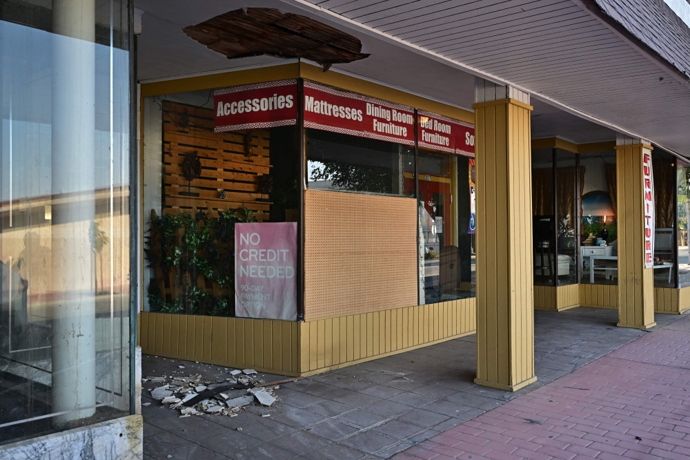 Closed and boarded up businesses remain along a once thriving Centre Street in Taft, Kern County, California on September 21, 2023. — AFP pic