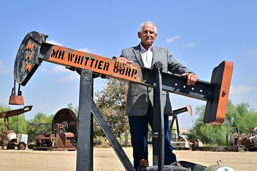 David Noerr, Mayor of Taft, stands beside a once-working pumpjack at the West Kern Oil Museum in Taft, Kern County, California September 21, 2023. — AFP pic