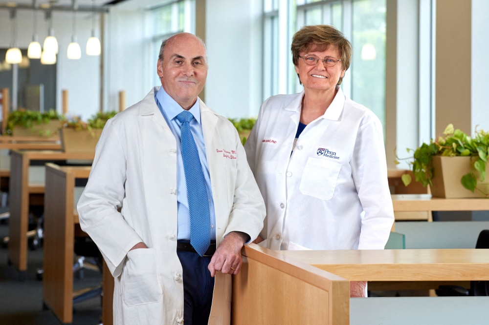 Penn Medicine scientists Katalin Kariko and Drew Weissman, who won the 2023 Nobel Prize in Physiology or Medicine for discoveries enabling the development of mRNA Covid-19 vaccines, pose in an undated photograph at the University of Pennsylvania in Philadelphia, Pennsylvania. — Peggy Peterson Photography/Penn Medicine handout picvia Reuters 