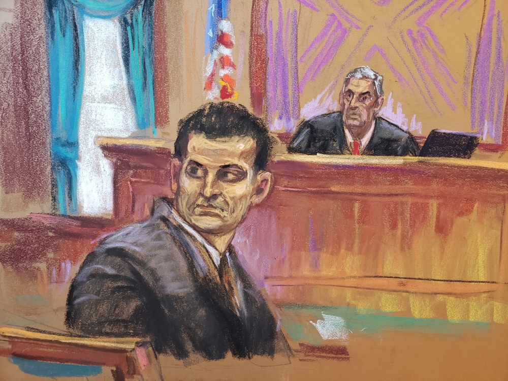 Sam Bankman-Fried turns to check out potential jurors for his fraud trial before U.S. District Judge Lewis Kaplan over the collapse of FTX, the bankrupt cryptocurrency exchange, at Federal Court in New York October 3, 2023 in this courtroom sketch. — Reuters pic