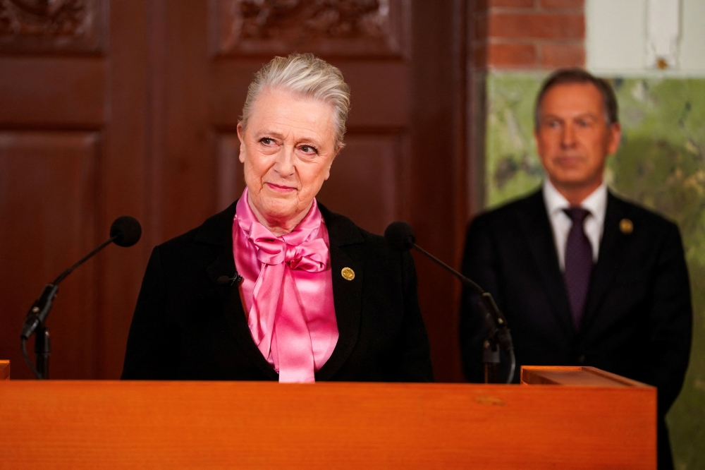 Nobel Committee Chair Berit Reiss-Andersen announces the winner of Nobel Peace Prize for 2023. — NTB/Terje Pedersen pic via Reuters 