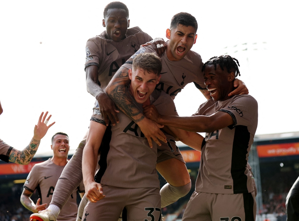 Tottenham Hotspur’s Micky van de Ven celebrates scoring their first goal with Destiny Udogie, Cristian Romero and Pape Matar Sarr during their match against Luton Town at the Kenilworth Road in Luton, Britain, October 7, 2023. — Reuters pic