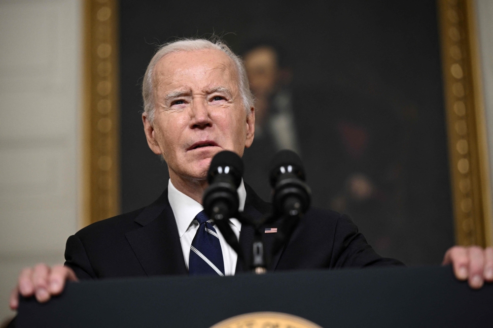 US President Joe Biden speaks about the Palestinian militant group Hamas' attacks on Israel in the State Dining Room of the White Houses in Washington, DC, on October 10, 2023. — AFP pic