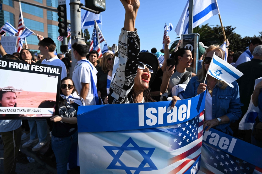 Demonstrators gather during a rally in support of Israel, outside the West Los Angeles Federal Building in Los Angeles, California, on October 10, 2023. — AFP pic