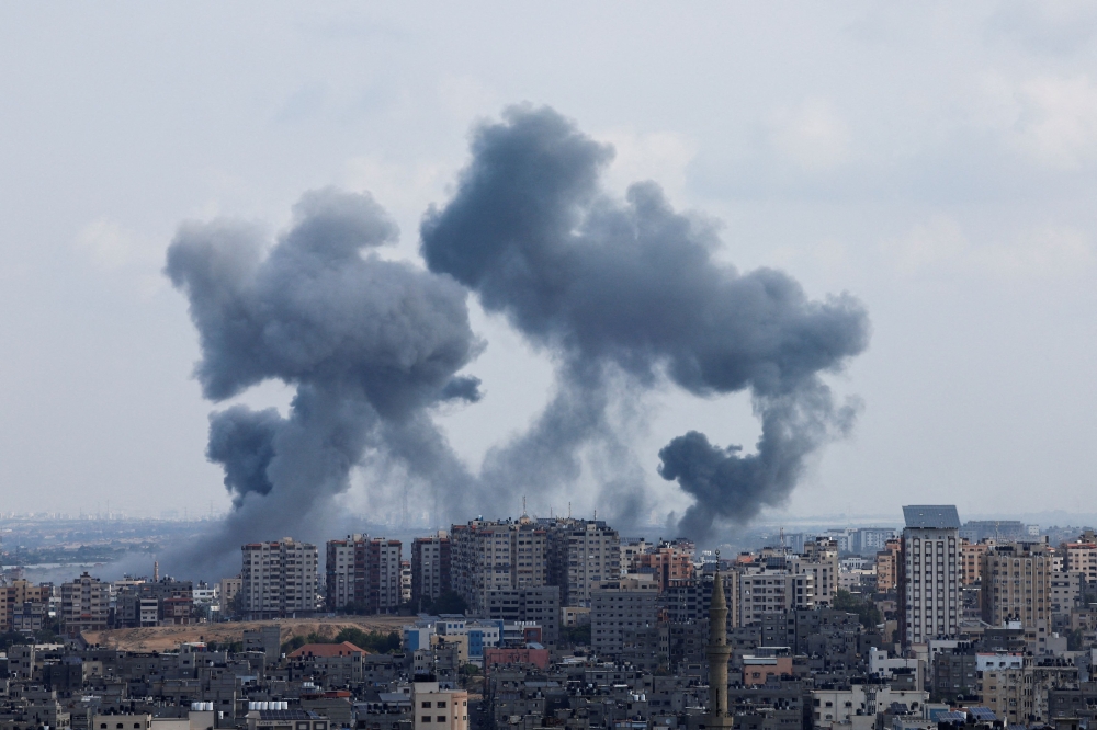 Smoke rises following Israeli strikes in Gaza, October 10, 2023. — Reuters pic