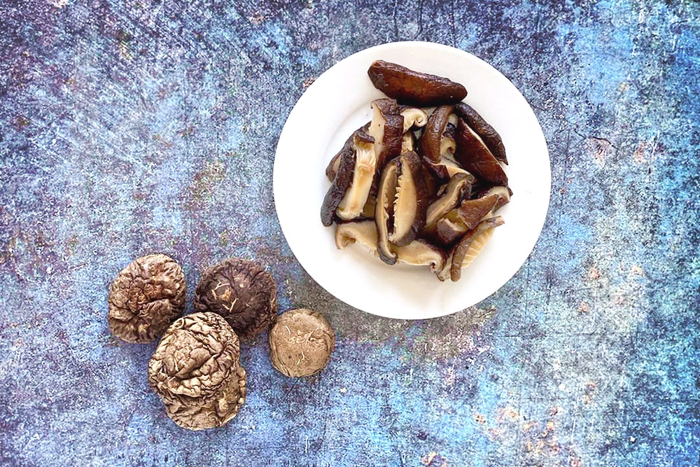 Shiitake mushrooms give the soup some heft as well as extra umami.