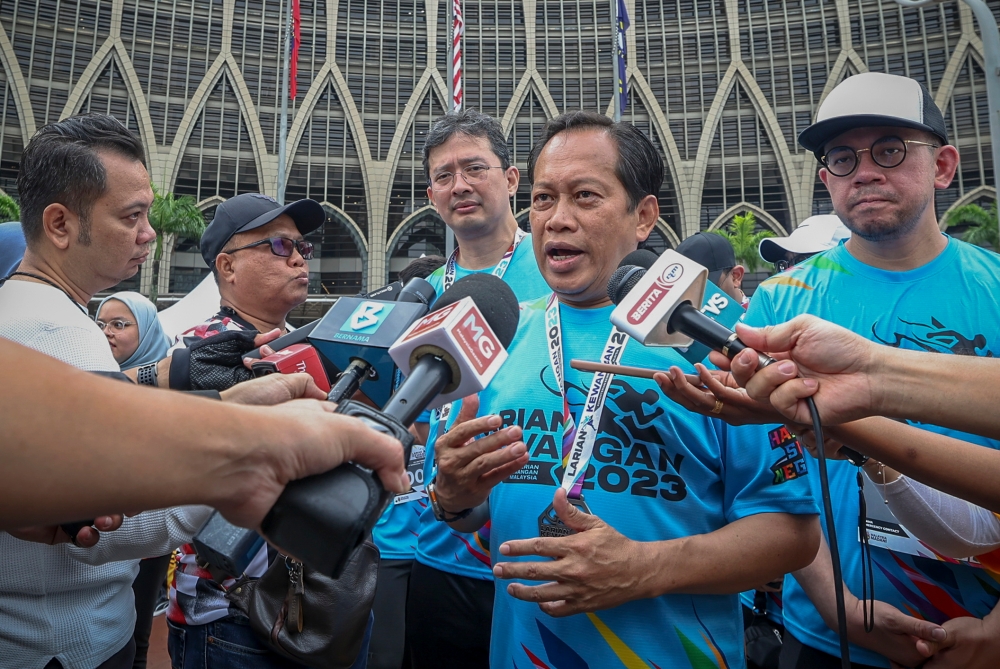 Deputy Finance Minister Datuk Seri Ahmad Maslan speaks to reporters after the “Larian Kewangan” programme in Putrajaya October 15, 2023. — Bernama pic