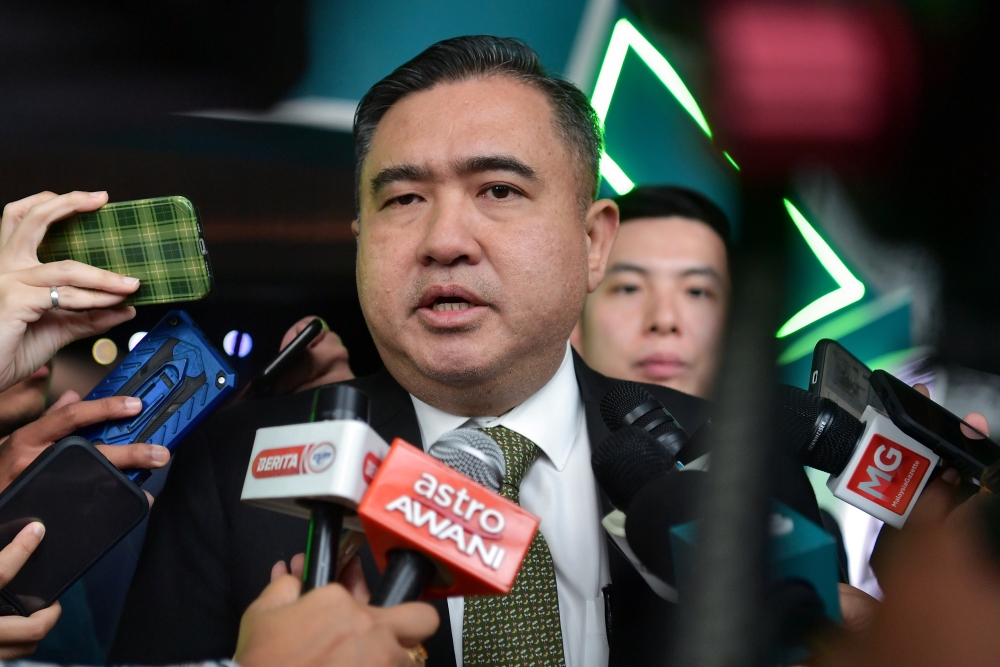 Transport Minister Anthony Loke speaks to reporters at the launch of Malaysia’s and Asia’s first electric prime mover here today by Swift Haulage Bhd (Swift) in Kuala Lumpur October 16, 2023. —  Bernama pic