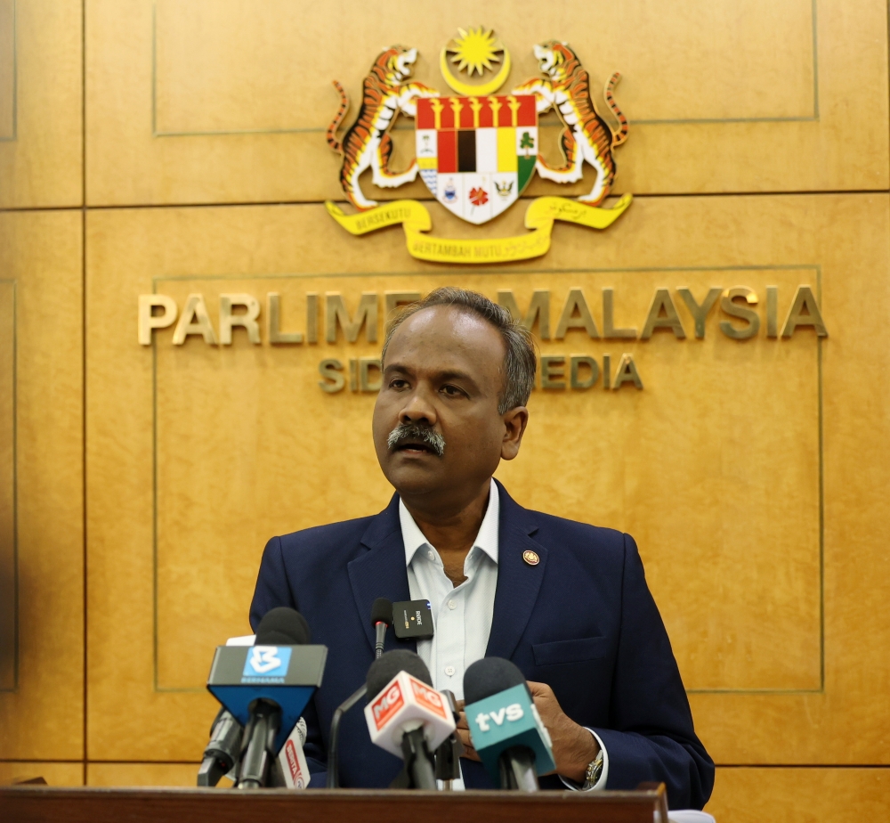 Human Resources Minister V. Sivakumar speaks at a press conference today at the Parliament building. — Bernama pic