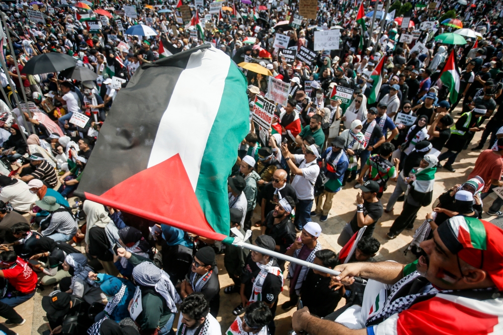 Malaysians gather to show their solidarity during the Freedom For Palestine rally at Dataran Merdeka in Kuala Lumpur October 19, 2023. — Picture by Hari Anggara