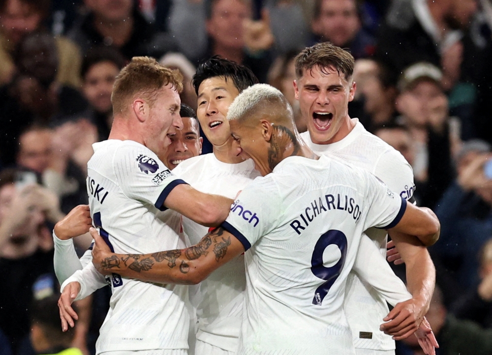 Tottenham Hotspur's Son Heung-min celebrates scoring their first goal with teammates at the Tottenham Hotspur Stadium in London October 23, 2023. — Reuters pic