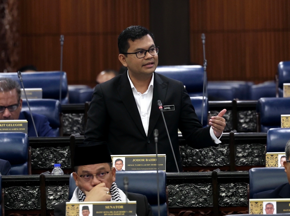 Deputy Local Government Development Minister Akmal Nasrullah Mohd Nasir speaks at the Parliament in Kuala Lumpur October 24, 2023. — Bernama pic