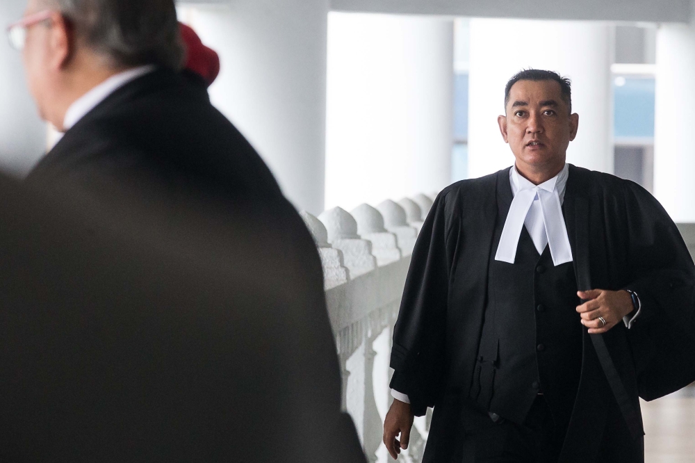 Deputy public prosecutor Ahmad Akram Gharib argued that the prosecution’s application to amend the three charges faced by Datuk Seri Najib Razak is not done in bad faith and does not breach any constitutional protection and rights. — Picture by Sayuti Zainudin   