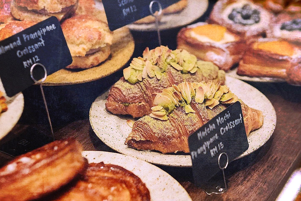 Matcha Mochi Frangipane Croissant and other baked goodies at Kona Bakehouse.