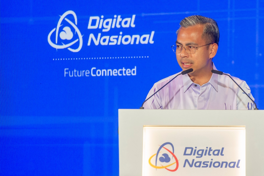 Communications and Digital Minister Fahmi Fadzil speaks at the launch of DNB’s 5G Experience Centre at Tun Razak Exchange in Kuala Lumpur on October 26, 2023. — Picture by Shafwan Zaidon