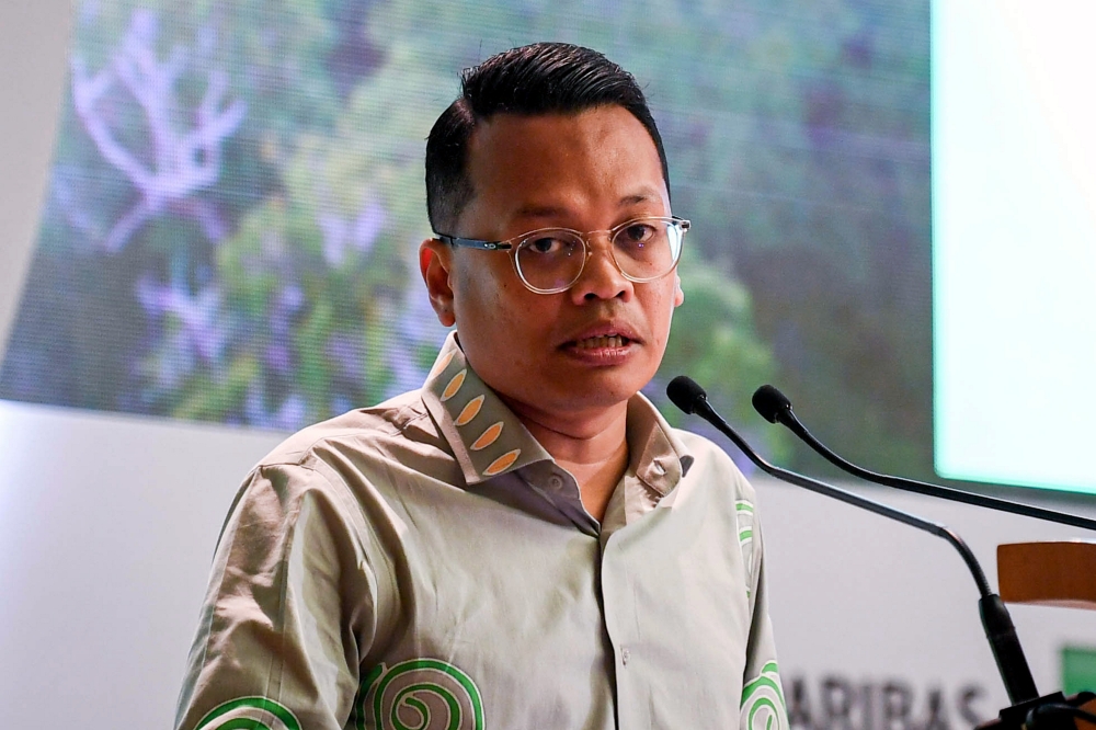 Minister of Natural Resources, Environment and Climate Change (NRECC) Nik Nazmi Nik Ahmad in a statement today said the federal government disagrees, in principle, with the state’s move to declassify parts of its permanent forest reserve as environmentally non-sensitive areas. — Bernama pic