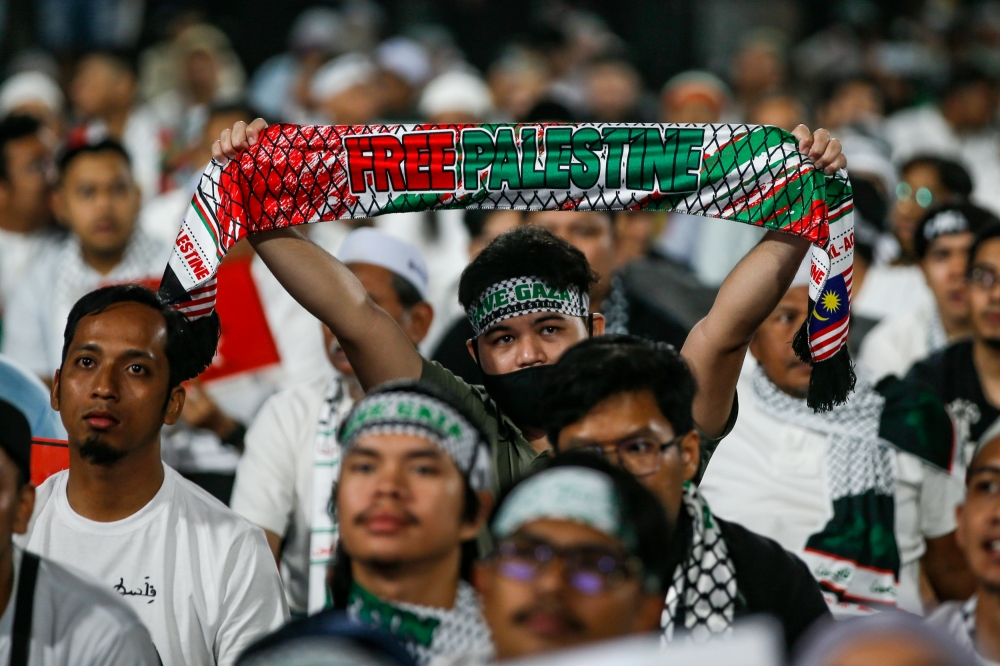 People attend the Solidarity with Palestine rally in the wake of the conflict between Israel and Hamas in the Gaza at Axiata Arena, Bukit Jalil October 24, 2023. — Picture by Hari Anggara