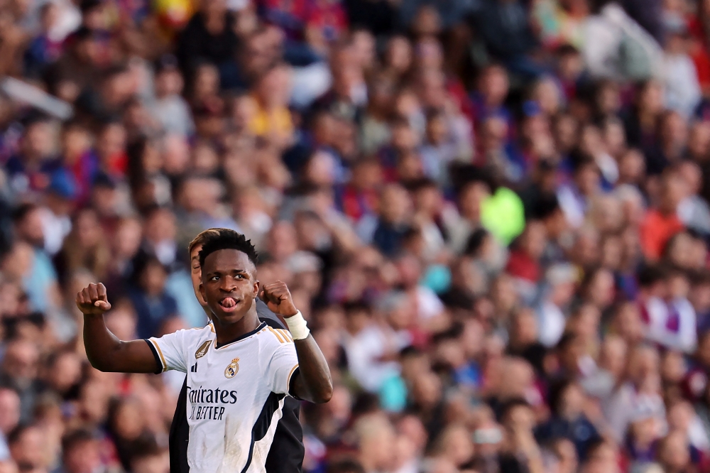 Real Madrid's Brazilian forward #07 Vinicius Junior gestures as he leaves the pitch during the Spanish league football match between FC Barcelona and Real Madrid CF at the Estadi Olimpic Lluis Companys in Barcelona on October 28, 2023. — AFP pic