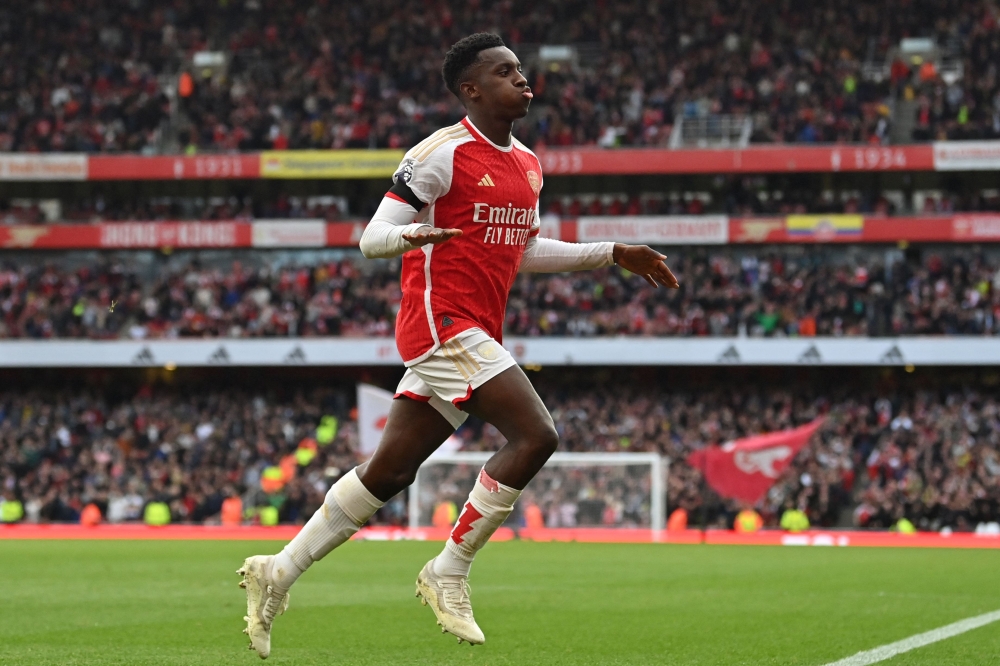 Arsenal's English striker #14 Eddie Nketiah celebrates after scoring their second goal during the English Premier League football match between Arsenal and Sheffield United at the Emirates Stadium in London on October 28, 2023. — AFP pic