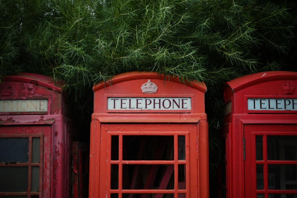 Traditional British telephone boxes waiting to be restored at 