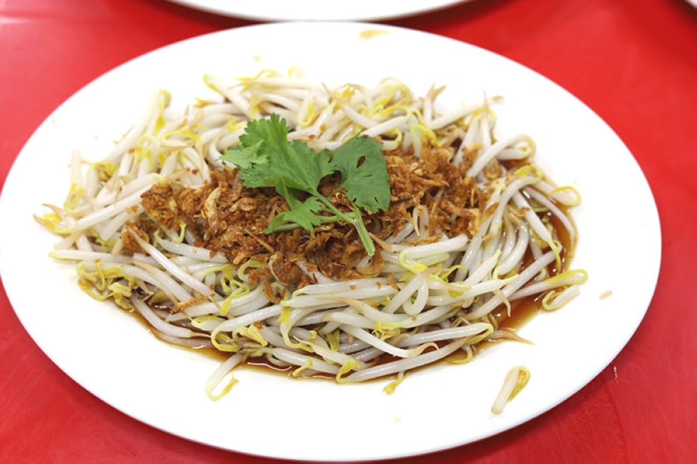 Bean sprouts get a flavour boost with the use of crispy dried prawns mixed with fried shallots