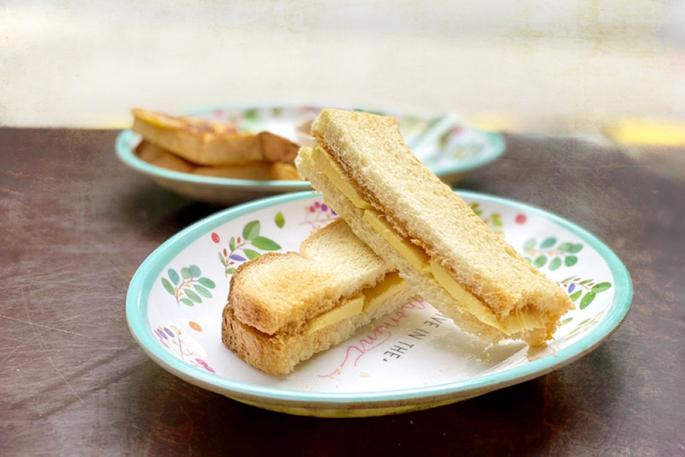 Some 'roti bakar' with aromatic kaya and rich butter for dunking.