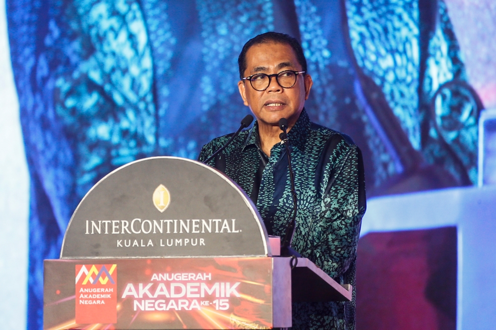 Higher Education Minister Datuk Seri Mohamed Khaled Nordin delivers Prime Minister Datuk Seri Anwar Ibrahim’s speech during the 15th National Academic Awards Ceremony in Kuala Lumpur October 31, 2023. — Picture by Hari Anggara