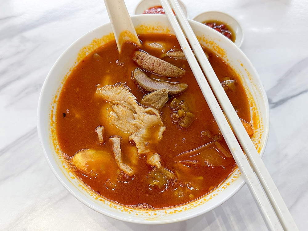 Their Homemade Luncheon Meat Tomato Pork Noodle has a sweeter tomato infused broth.