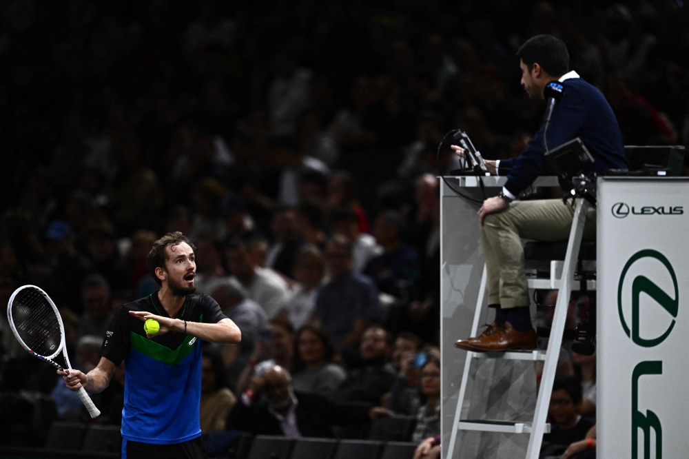 Daniil Medvedev argues with the referee during his men’s singles match against Bulgaria’s Grigor Dimitrov on day three of the Paris ATP Masters 1000 tennis tournament at the Accor Arena, Palais Omnisports de Paris-Bercy, in Paris on November 1, 2023. — AFP pic 