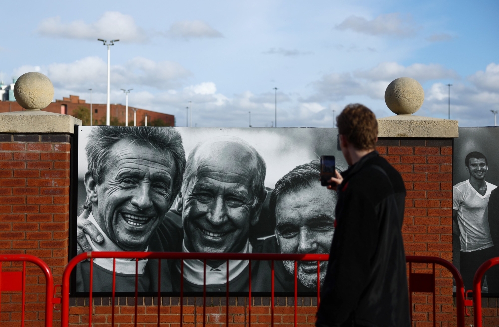 General view of an image of Bobby Charlton outside the stadium before the Manchester United v Manchester City match following his passing, Old Trafford, Manchester, October 29, 2023. — Reuters 