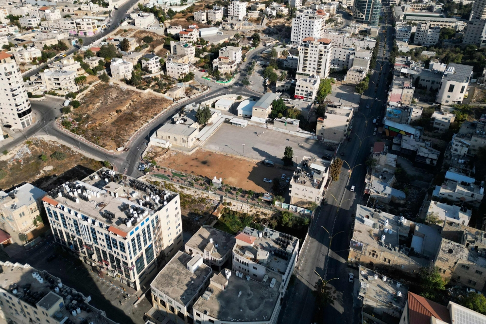 An aerial picture shows a view of Hebron city in the occupied West Bank during a general strike in support of Palestinians of the Gaza Strip, on November 1, 2023, amid ongoing battles between Israel and the Palestinian Hamas movement. — AFP pic