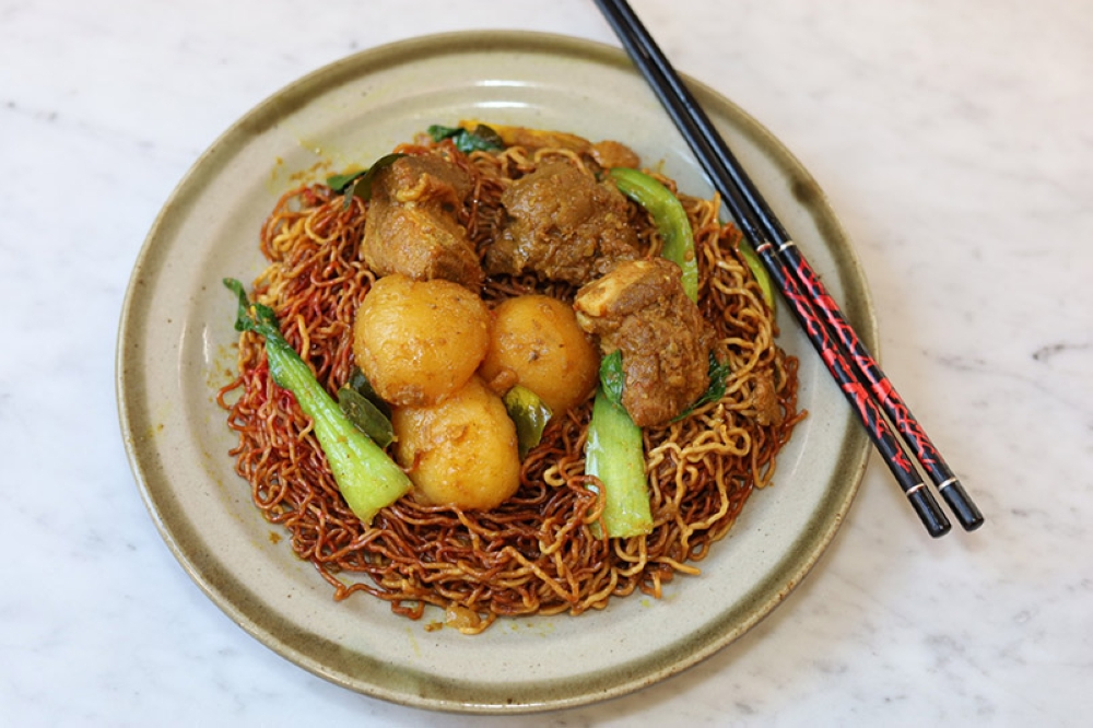 Curry pork rib and potatoes with your 'wantan mee'? It's a great combination with the soft potatoes