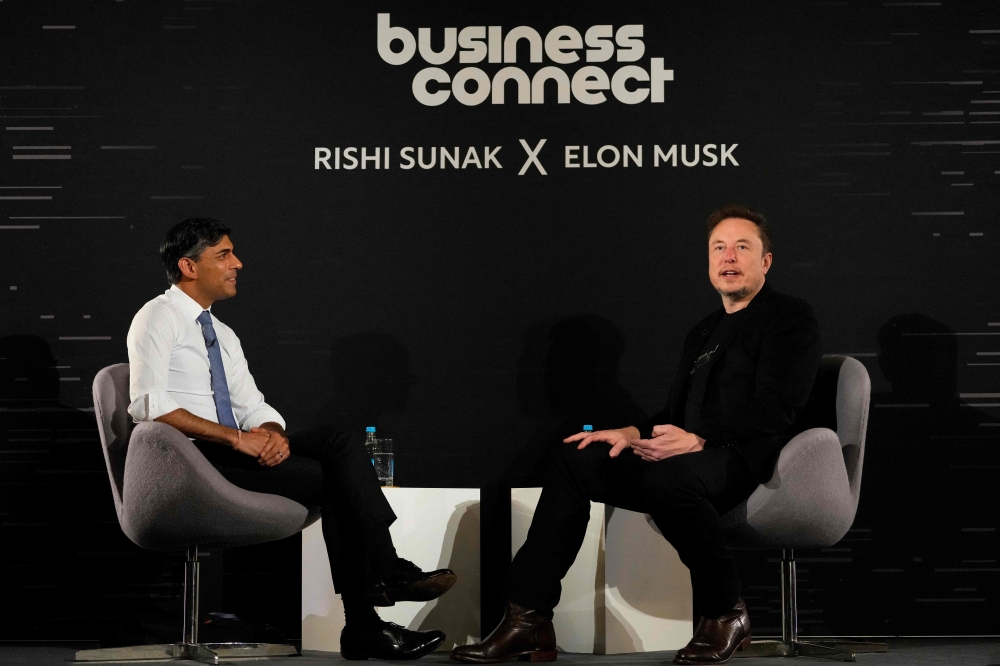 Britain's Prime Minister Rishi Sunak attends an in-conversation event with X (formerly Twitter) CEO Elon Musk in London on November 2, 2023, following the UK Artificial Intelligence (AI) Safety Summit. — AFP pic