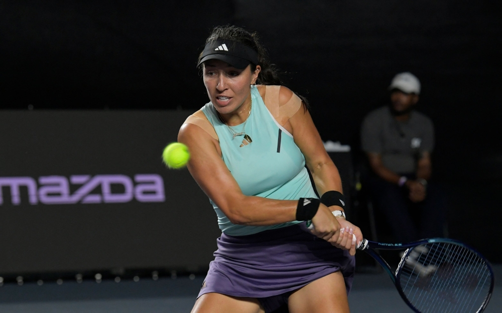 Jessica Pegula of the United States returns the ball against Maria Sakkari of Greece during their women's singles match of the WTA Finals tennis championships in Cancun, Mexico, November 2, 2023. — AFP pic