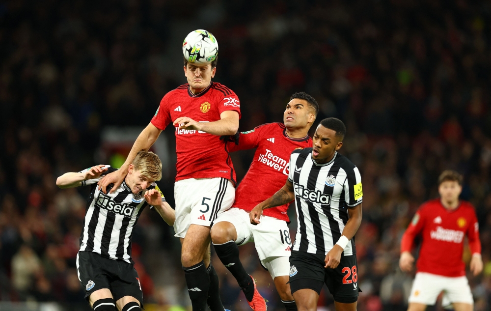 Manchester United’s Harry Maguire and Casemiro in action with Newcastle United’s Anthony Gordon and Joe Willock at Old Trafford, Manchester, November 1, 2023. — Reuters pic 